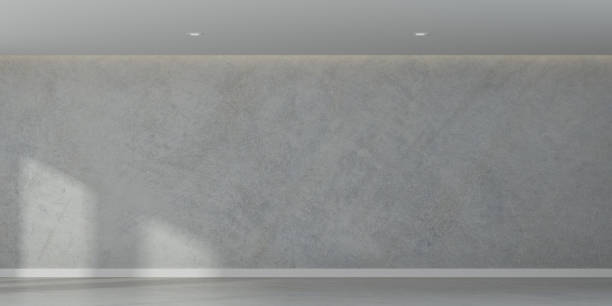istock 3D rendering of white room space with interior lighting and sun light cast the window shadow on the wall and floor,Perspective of minimal design architecture 958021472