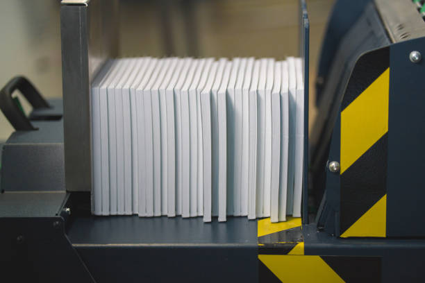 istock Professional printing equipment for pressing stacks of paper 958033744