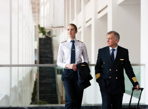 istock Flight crew preparing to go to airplane 958034172