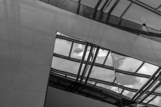 istock The glass architecture in city against a sky 958034732