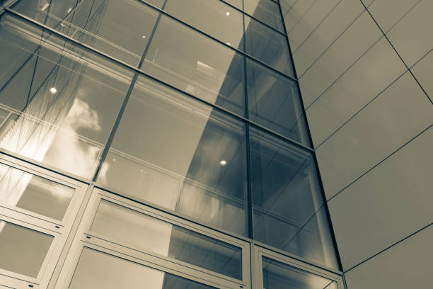 istock The glass architecture in city against a sky 958034892