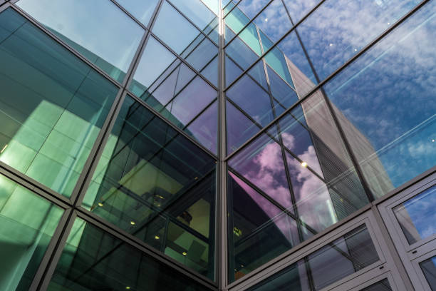 istock The glass architecture in city against a sky 958037570
