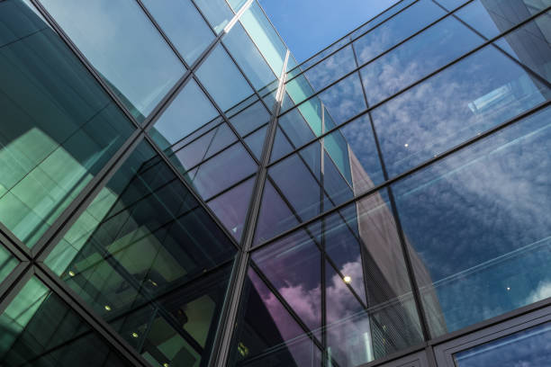 istock The glass architecture in city against a sky 958037792