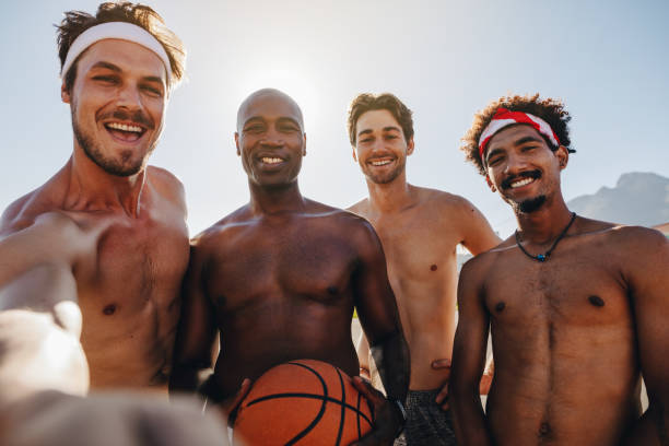 istock Basketball players posing for photo 958045910