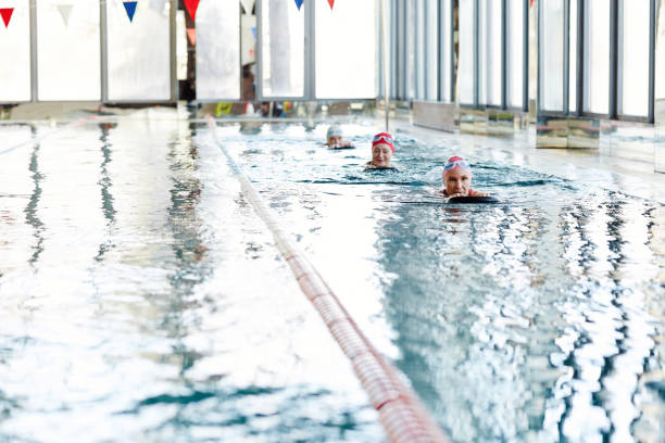 istock Women swimming 958051510