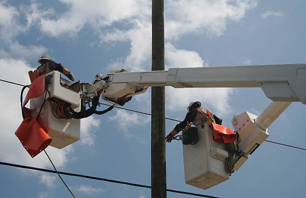 Pulling the Power Lines stock photo