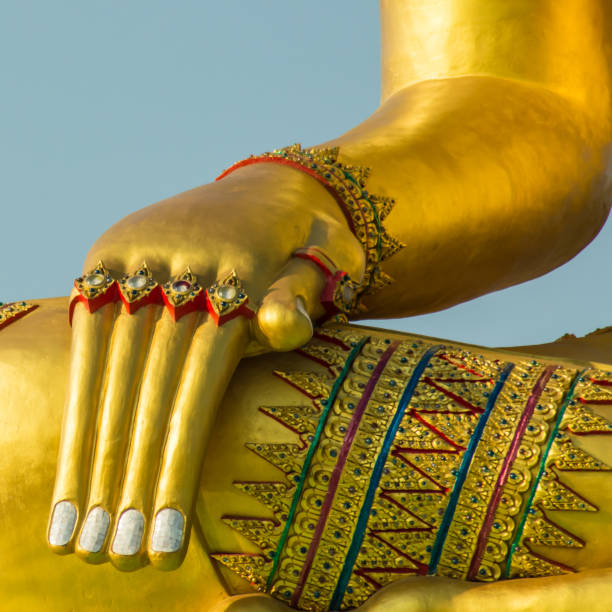 istock Golden image of buddha hand thai style 958056582