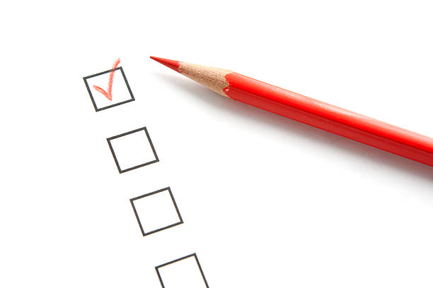 istock Survey Questionnaire with Red Pencil and Check Mark 95805983