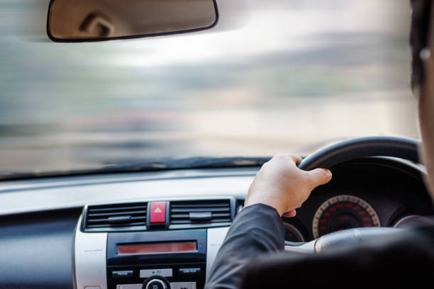 istock Businessman driving his car 958060270