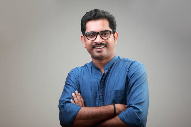 istock Portrait of happy young man 958063740