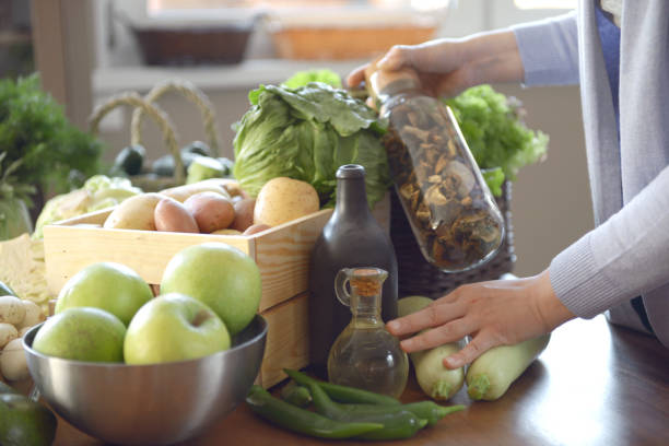 istock woman cooking in the kitchen 958064558
