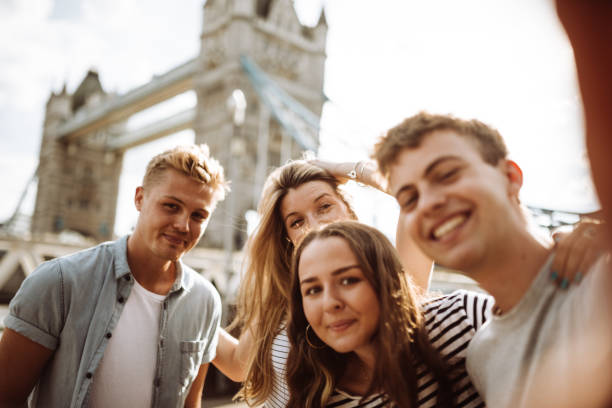 istock group of tourist take a selfie at tower bridge 958064884