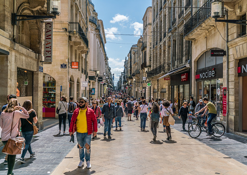 Bordeaux, France, 9 may 2018 -tourists and locals shooping in the main shopping street 'Rue Sainte-Catherine'