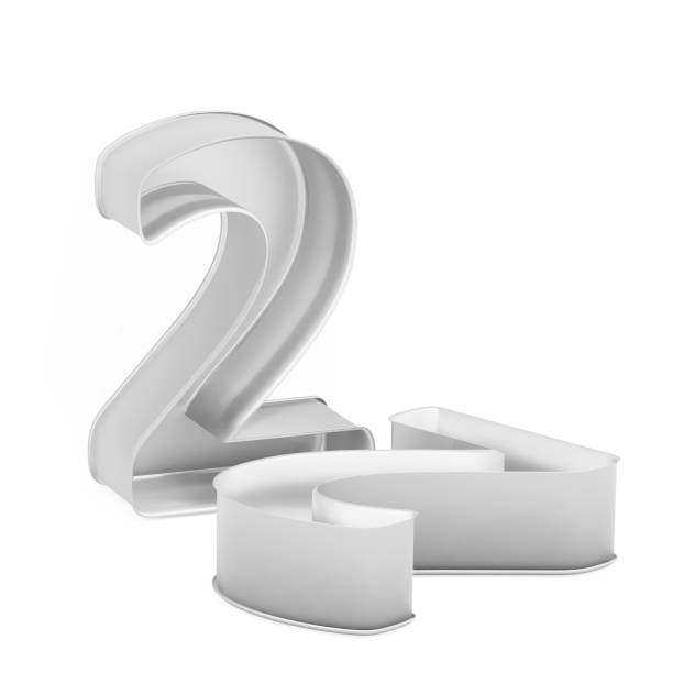 istock Metal baking cake pan or cookie cutter set like mathematical digit 2 on white background 958065148