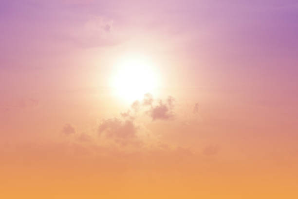 istock sweet pastel cluse up sun light on sky with cloud in front 958065494