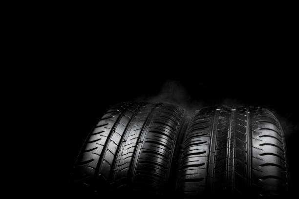 istock Car tyre isolated on a black background 958068590