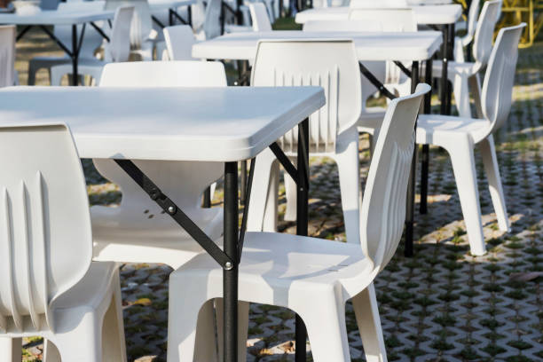 istock White tables and chairs in festival 958069362