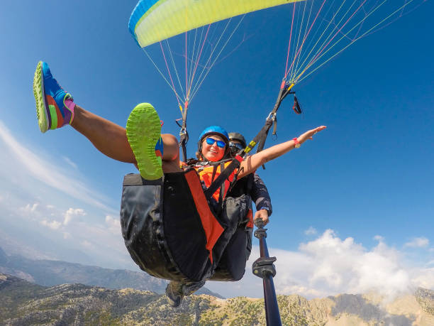 Paragliding Paragliding paraglider stock pictures, royalty-free photos & images