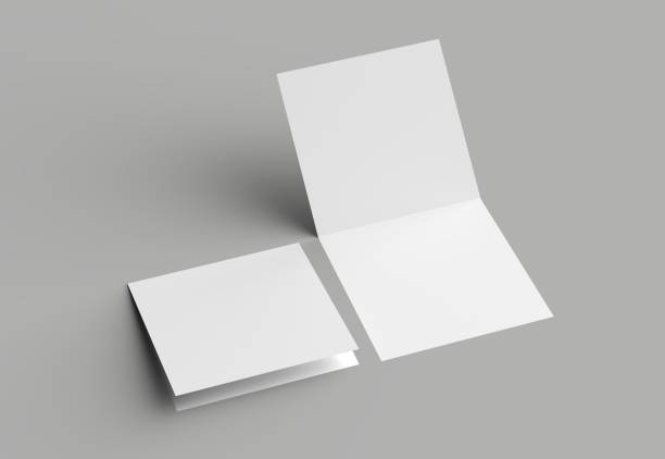istock Bi fold square brochure or invitation mock up isolated on gray background. 958090610
