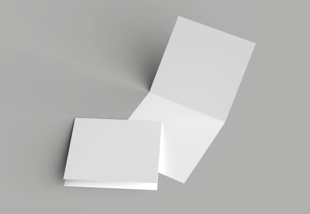 istock Bi fold square brochure or invitation mock up isolated on gray background. 958091022