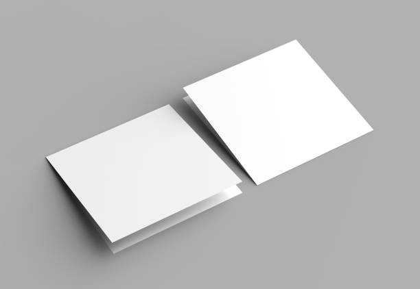 istock Bi fold square brochure or invitation mock up isolated on gray background. 958091498