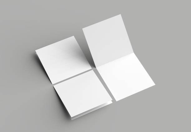 istock Bi fold square brochure or invitation mock up isolated on gray background. 958091802