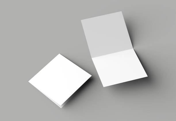 istock Bi fold square brochure or invitation mock up isolated on gray background. 958095506