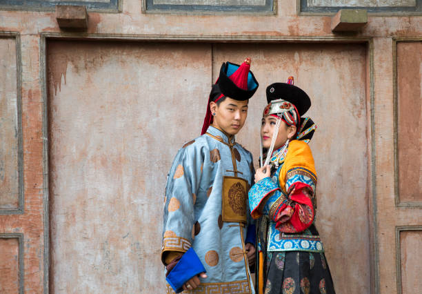 istock mongolian man in traditional outfit 958104822