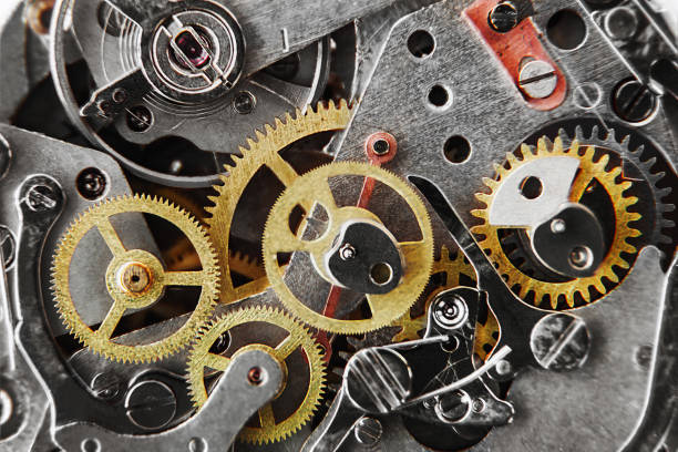 istock clock mechanism with gears and parts 958112682