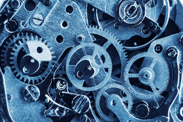 istock clock mechanism with gears and parts 958112736