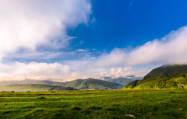 istock beautiful sunrise in mountains 958115012