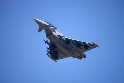 Arrecife, Spain – September 25, 2014: Spanish Air Force F-18 Hornet fighter jets on final for landing in Arrecife