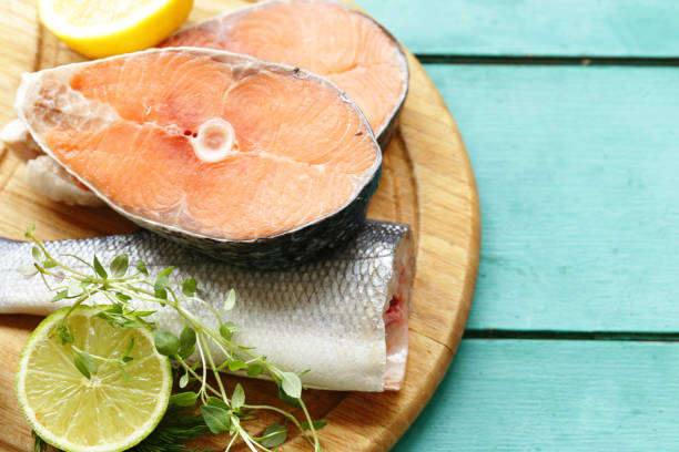 istock raw fish sea bass and salmon 958118286