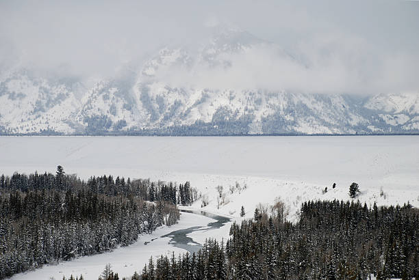 The Tetons in a snowstorm stock photo