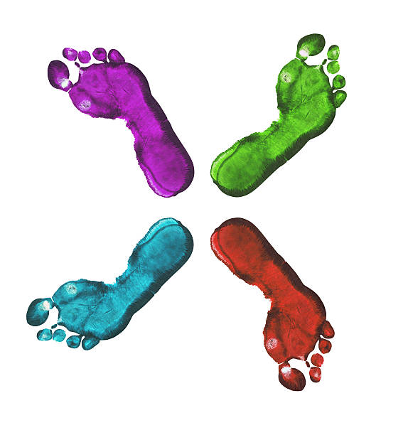 istock Four colourful footprints in opposite directions 95812579