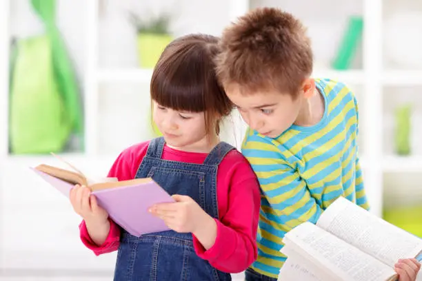 Start of school - little children reading books