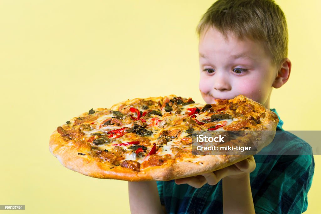 Funny Boy Eating A Big Pizza Stock Photo - Download Image Now - Pizza,  Child, Humor - iStock