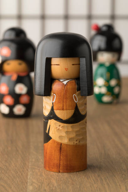 Traditional Japanese wooden kokeshi dolls sold as souvenir