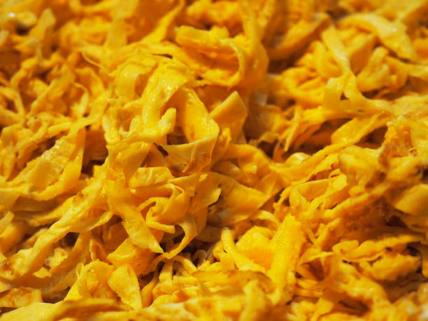 istock Macro close up sliced cut Thai omelet fried egg background 958135786