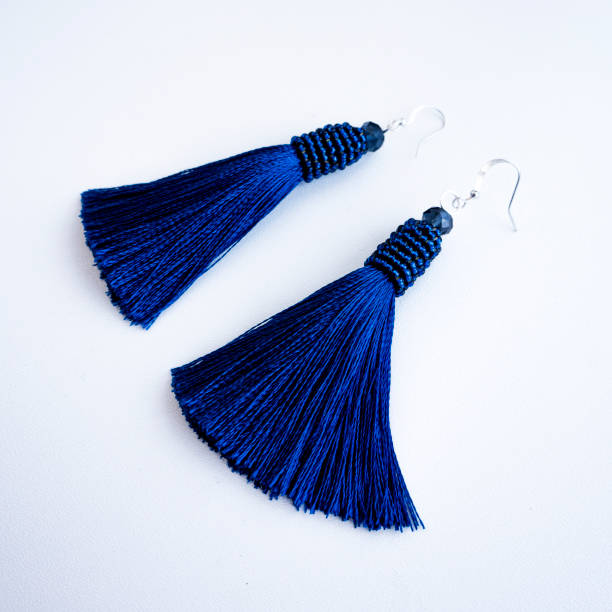 istock Handmade blue earrings-brushes with beads. 958139840