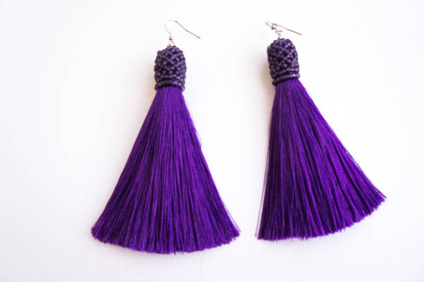istock Handmade purple earrings-brushes with beads. 958140500