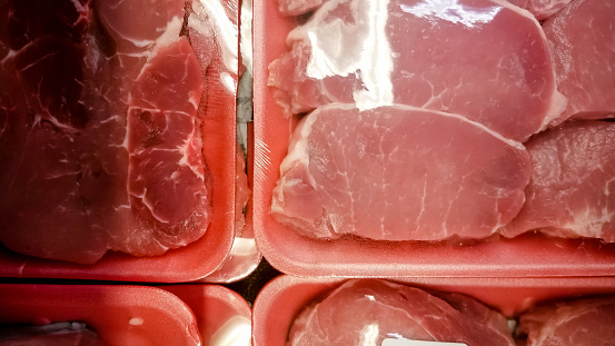 A variety of cuts of pork at the supermarket