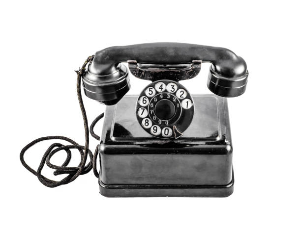 istock Old vintage black phone on white background 958154664