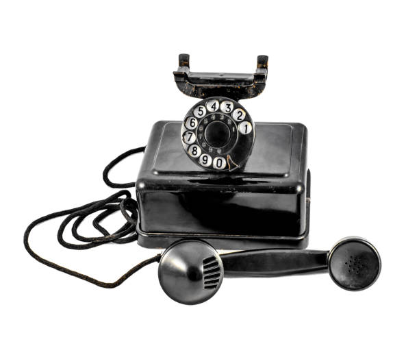 istock Old vintage black phone shot on white background 958154690