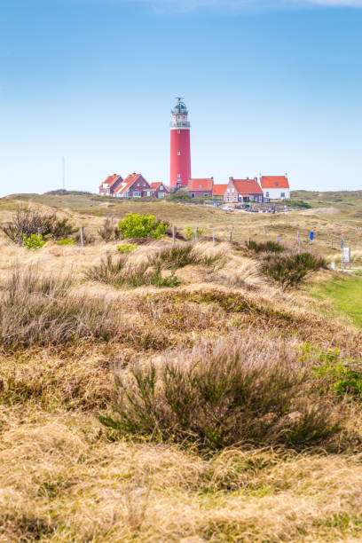 panorama avec phare texel pays-bas - sea sign direction beacon photos et images de collection
