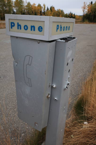 istock shot phone box with bullet holes Alaska 958158136
