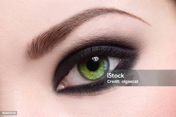 Womans Green Eye With Heavy Makeup Stock Photo - Download Image Now - Adult, Black Color, Blinking