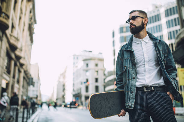 istock Handsome skater in city 958162420