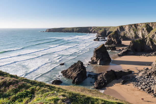 istock Stunning dusk sunset landscape image of Bedruthan Steps on West Cornwall coast in England 958172452