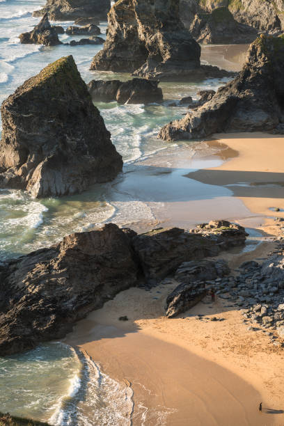 istock Stunning dusk sunset landscape image of Bedruthan Steps on West Cornwall coast in England 958172624